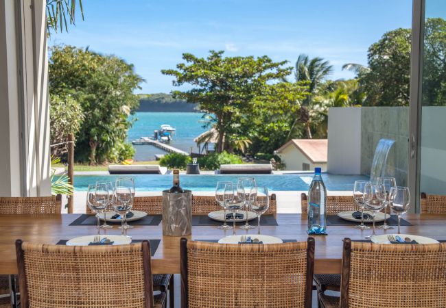 Villa sleeps 12 at Le François in the heart of a beautiful garden with private pontoon and sea view.