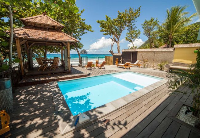 Luxury villa rental in Martinique on the beach facing Diamond Rock