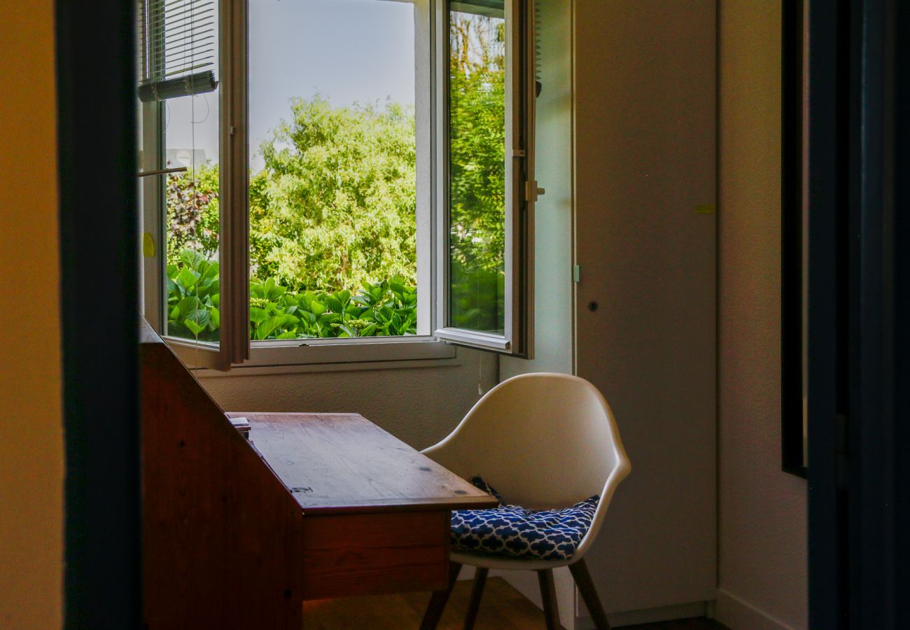 Separate room with a desk 