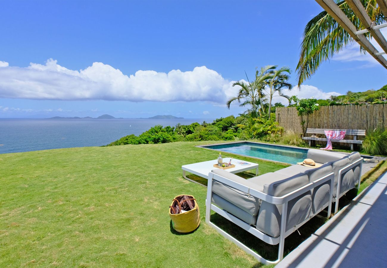 Panoramic sea view from the terrace and private pool at Villa Karuka in Trois-Rivières